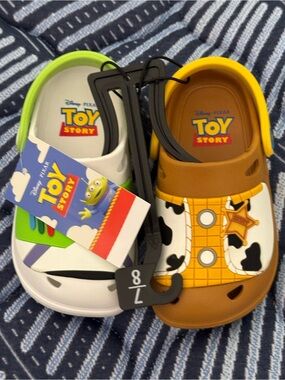 Disney Toy Story Kids' Clogs in White/Green and Brown/Yellow
